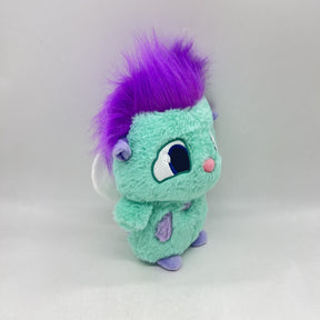 Personagem Bibble com corpo azul turquesa, topete roxo e pequenas asas nas costas